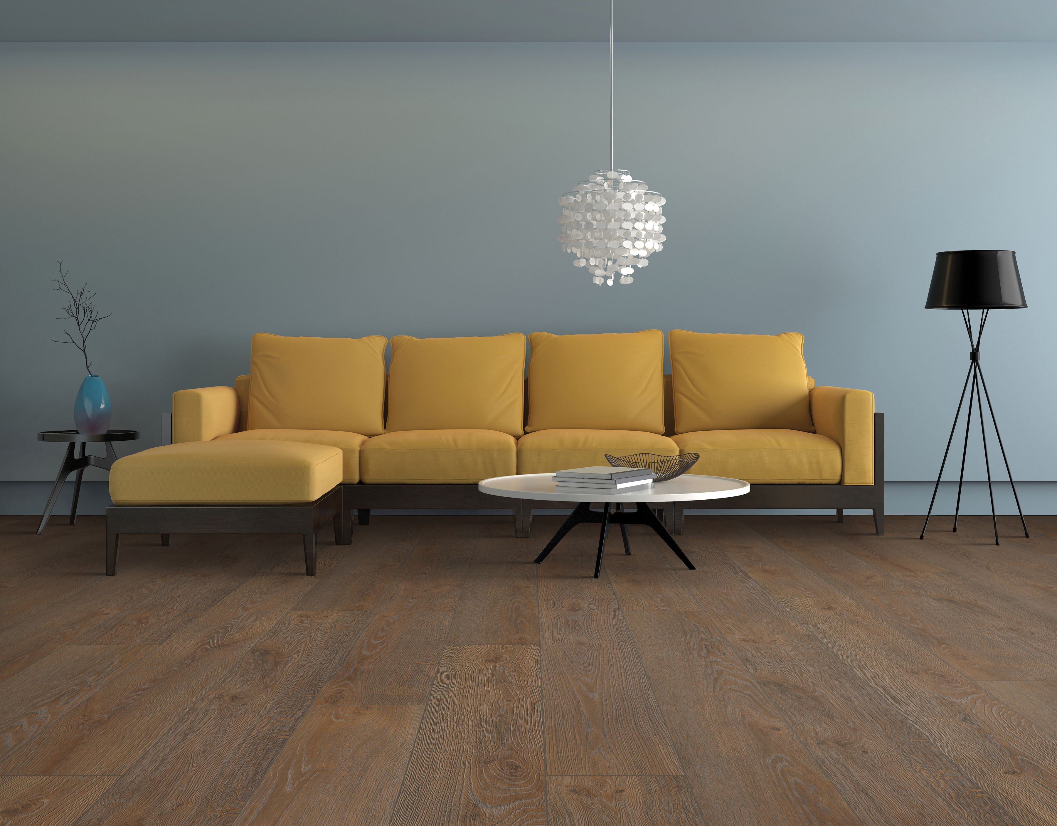 Brown wide plank LVP floors in living room with yellow couch