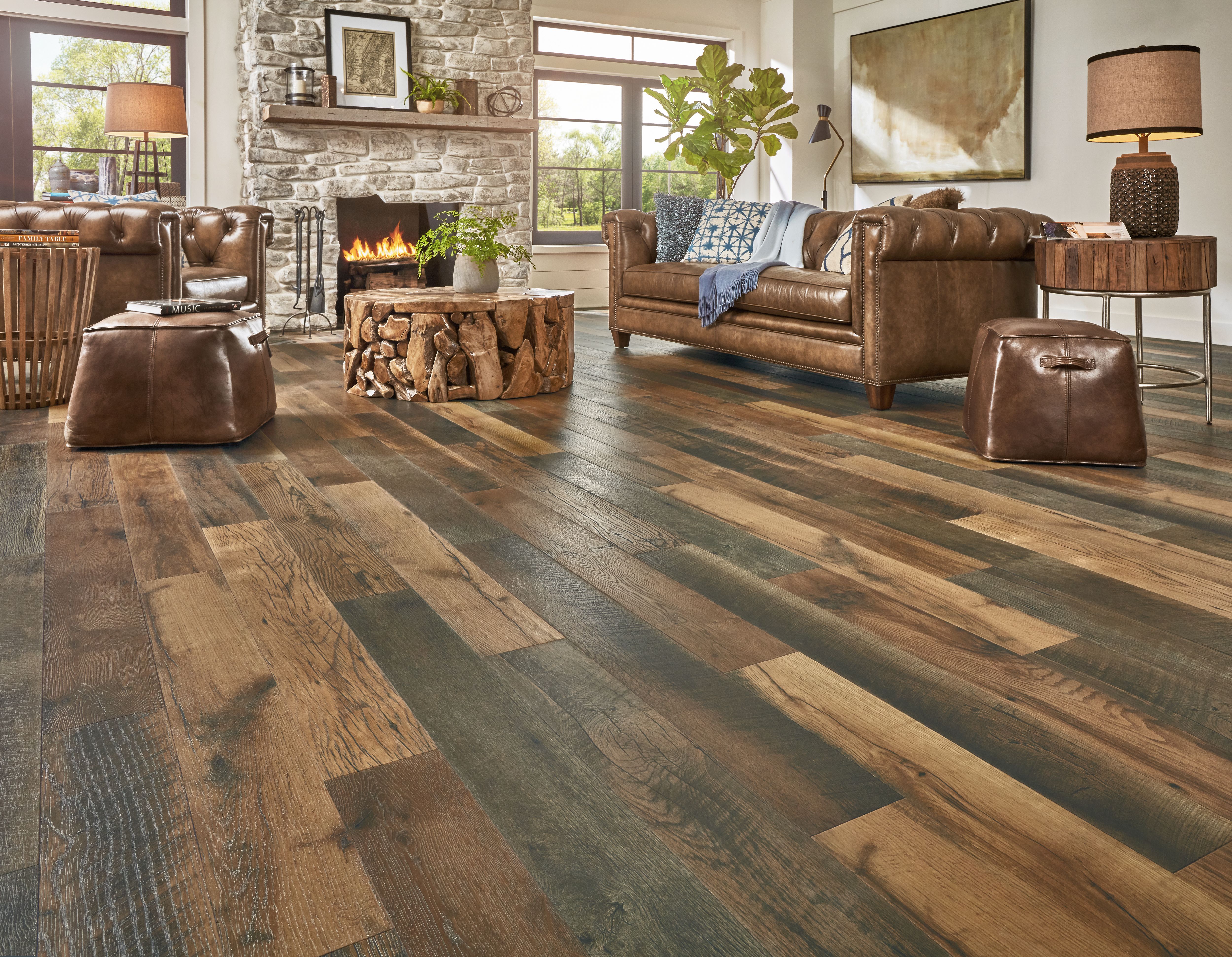 rich brown pergo wood floors in rustic living room
