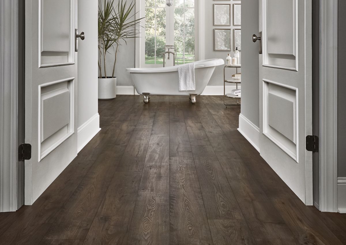 rich brown hardwoods in traditional bathroom