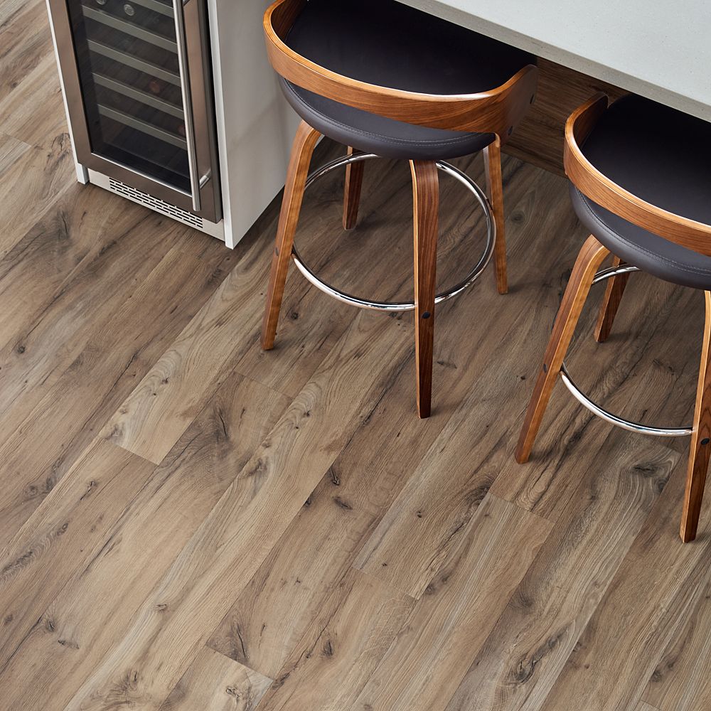 grey brown LVP floors in modern kitchen